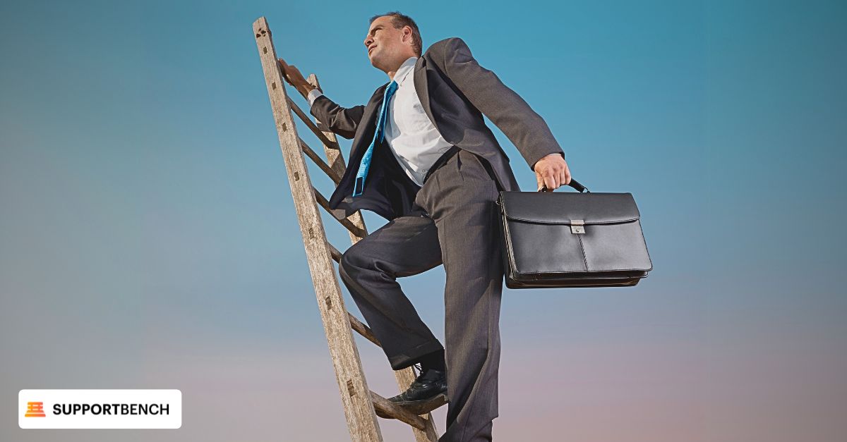 A man with a briefcase climbs a ladder, illustrating the challenges faced in tracking customer support metrics