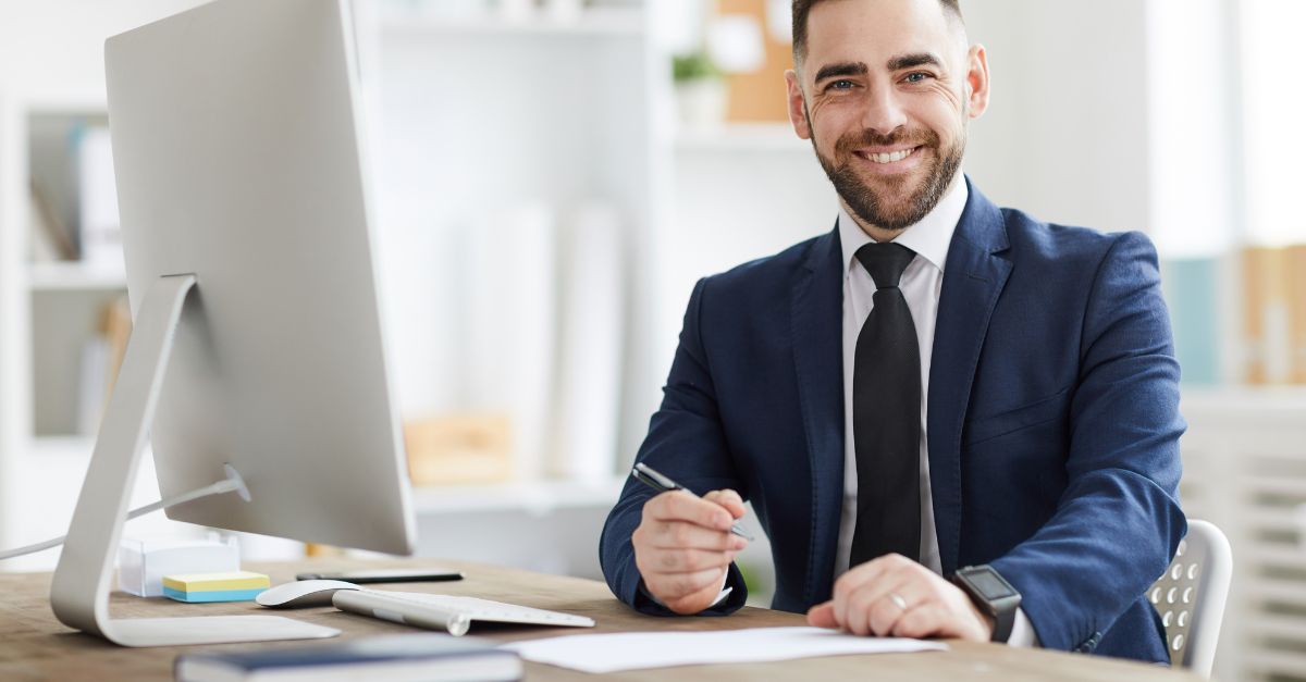 IT manager pointing at a screen 