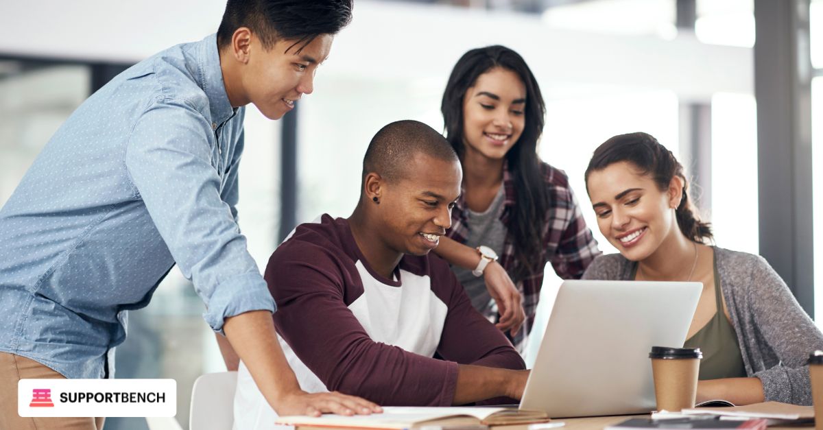 A group of internal support agents in a training session reviewing anonymized tickets