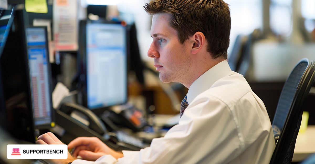 An MSP technician managing tickets on a multi-channel dashboard in a modern office